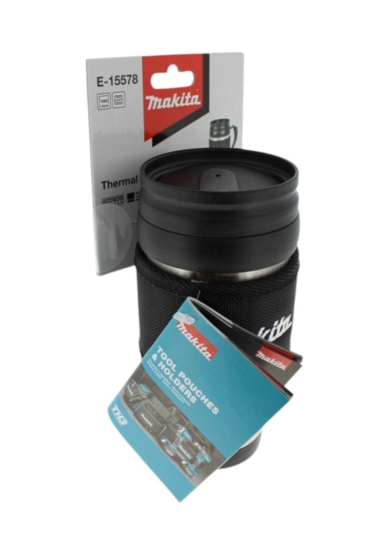 Black travel mug with black sleeve and Makita packaging on a white background